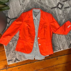 Blazer & sleeveless blouse.